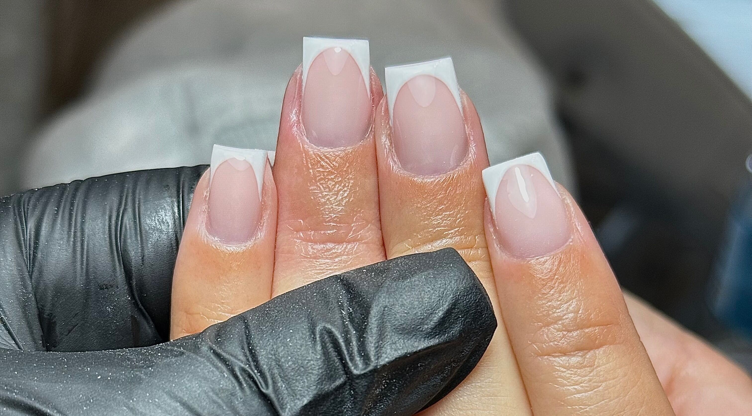 French manicure at Nailssby.han in Heywood, England, GB, showcasing glossy square nails.