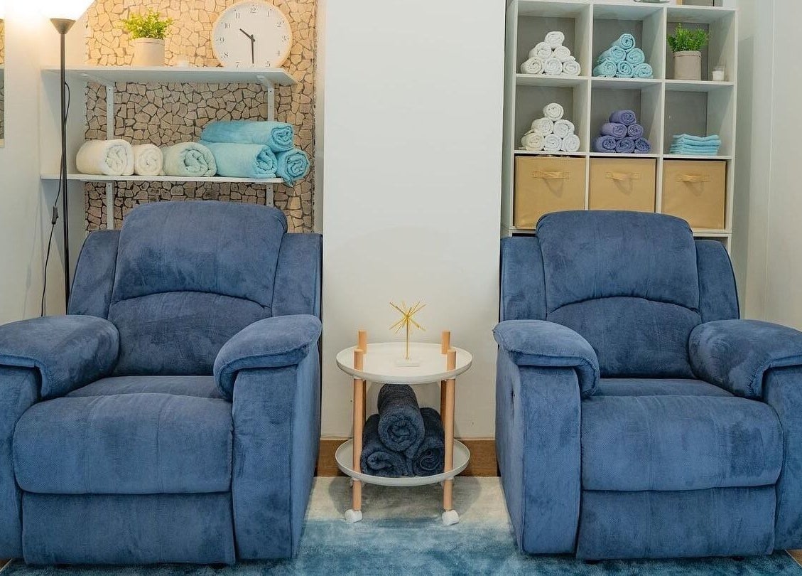 Cozy blue armchairs at Chilax, DARWIN CITY, Northern Territory, AU for ultimate relaxation.