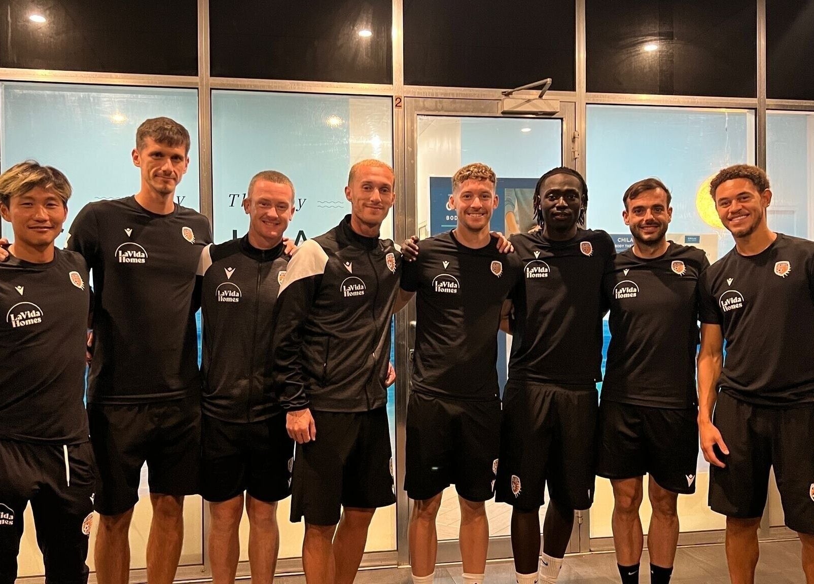 Team members at Chilax in DARWIN CITY, Northern Territory, AU foster camaraderie in stylish attire.