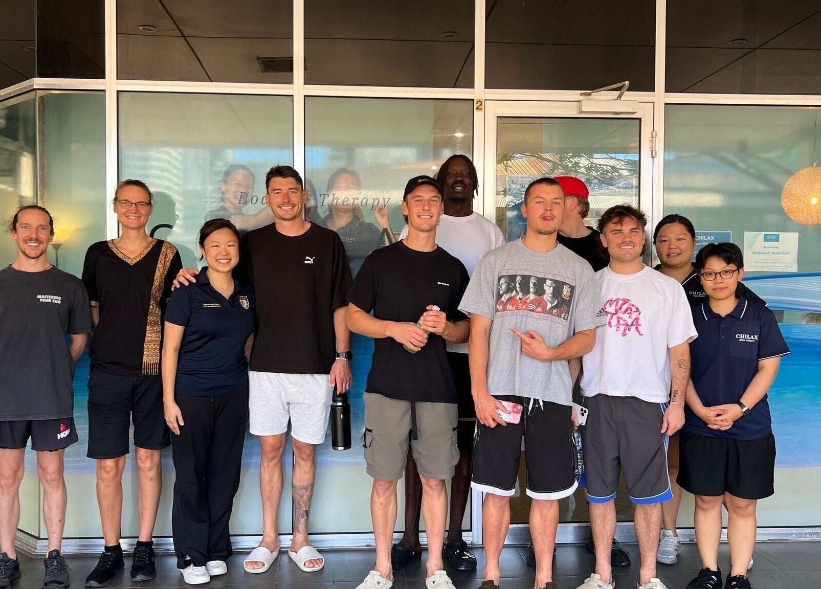 Team at Chilax smiling in front of venue in DARWIN CITY, Northern Territory, AU.