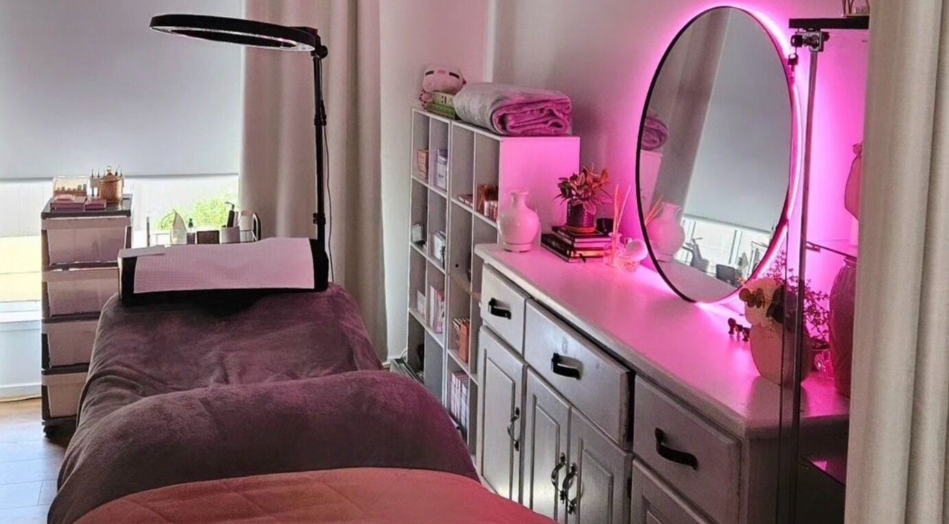 Relaxing treatment room at Beauty by Nikki in Wallan, Victoria, AU with ambient lighting and plush bedding.