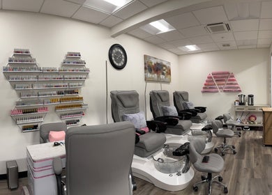 Elegant pedicure chairs and nail polish displays at Studio 8 Nail Bar in San Jose, California, US.