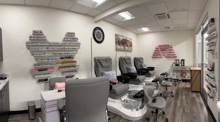 Elegant pedicure chairs and nail polish displays at Studio 8 Nail Bar in San Jose, California, US.