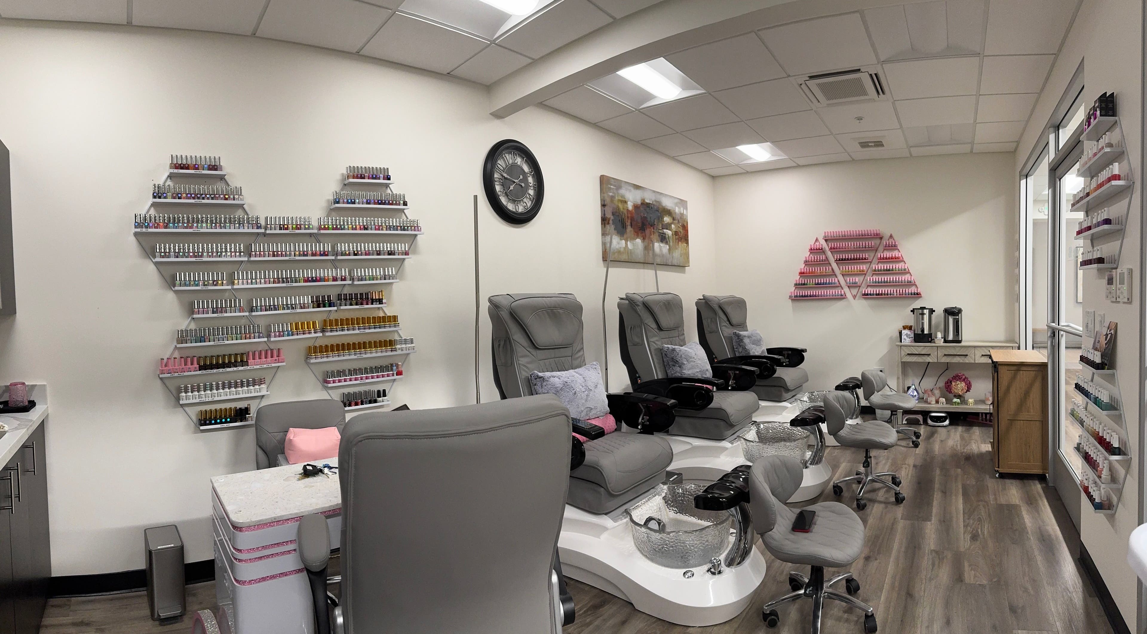 Elegant pedicure chairs and nail polish displays at Studio 8 Nail Bar in San Jose, California, US.