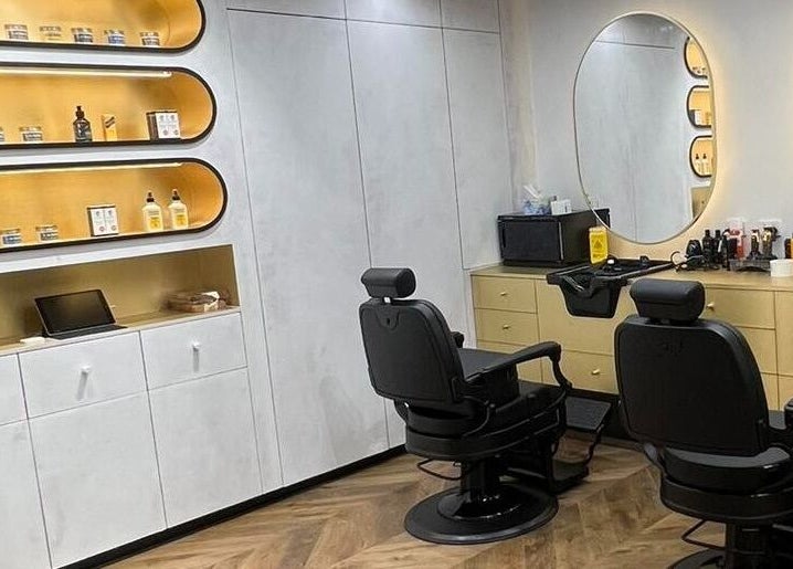 Sophisticated barber chairs at Quintessential Man in Redfern, New South Wales, AU, reflecting modern grooming style.