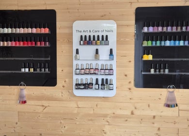 Colorful nail polish display at Fingers and Toes, Mexborough, England. Vibrant selection for nail art enthusiasts.