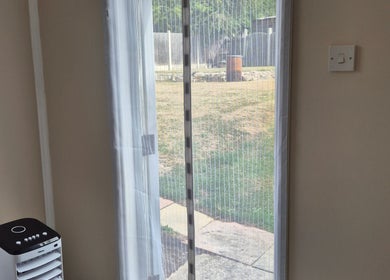 Calming window view at Fingers and Toes, Mexborough, England, GB, showcasing serene outdoor scenery.
