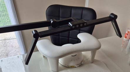 Modern nail station at Fingers and Toes, Mexborough, England, GB, with advanced adjustable lighting.