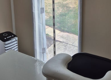 Relaxing treatment room at Fingers and Toes, Mexborough, England, GB with garden view.