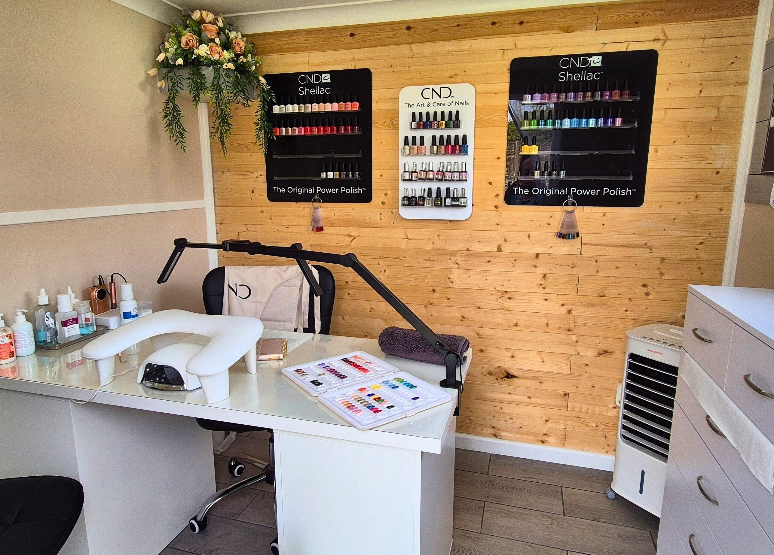 Cozy nail care station at Fingers and Toes in Mexborough, England, GB, featuring CND products and decor.