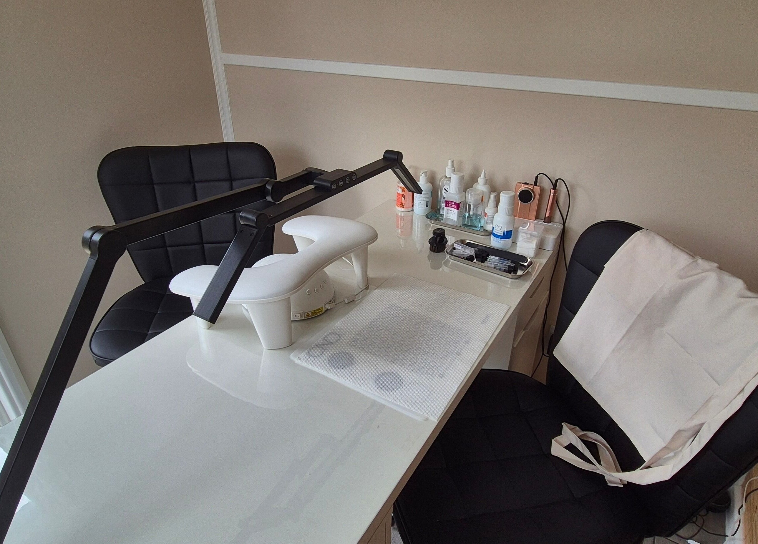 A sleek manicure station in Fingers and Toes, Mexborough, England, GB featuring essential nail care tools.