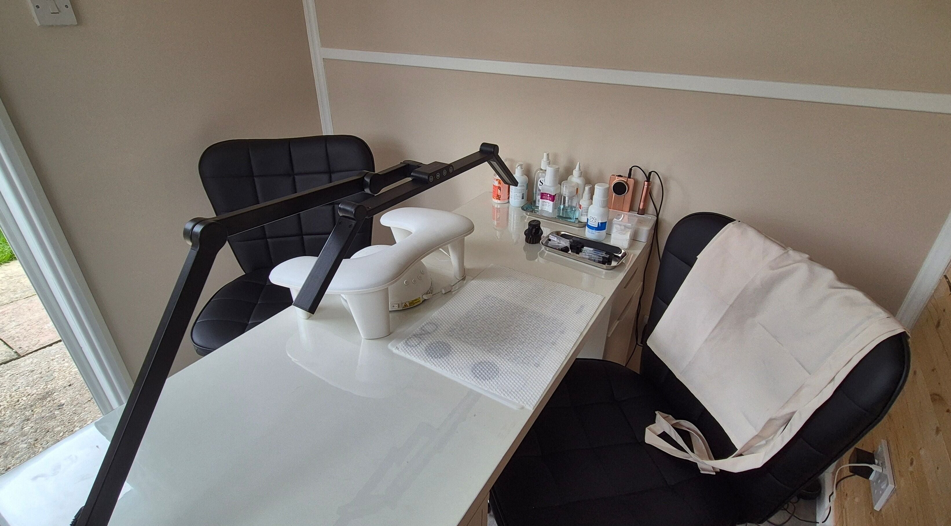 A sleek manicure station in Fingers and Toes, Mexborough, England, GB featuring essential nail care tools.