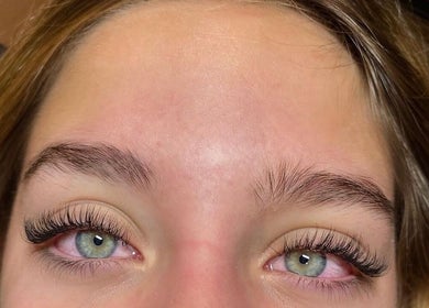 Close-up of full eyelashes done at Beauty Lounge, London, Ontario, CA, showcasing expert styling.