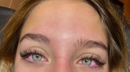 Close-up of full eyelashes done at Beauty Lounge, London, Ontario, CA, showcasing expert styling.