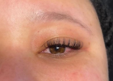 Close-up of eyelash extensions at Beauty Lounge in London, Ontario, CA showcasing elegance and precision.