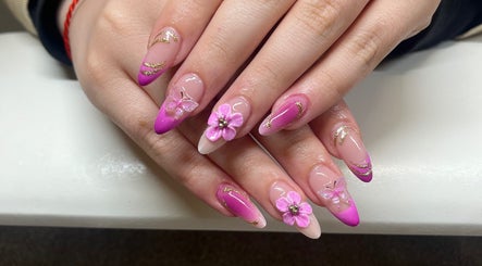 Beautiful floral nail art at Anna Nails, Cork, County Cork, IE featuring pink flowers and glitter details.