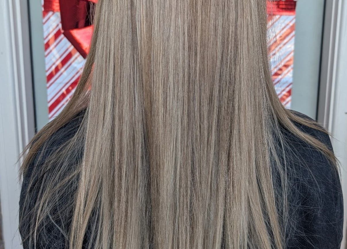 Smooth, straight hair styled at Fidelis Creations, Mabank, Texas, US showcasing professional salon skills.