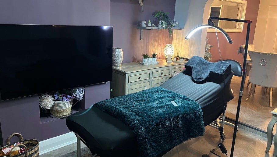 Relaxing spa treatment room at 888 Beauty by Jess, Ellesmere Port, England, GB, with cozy decor and treatment bed.