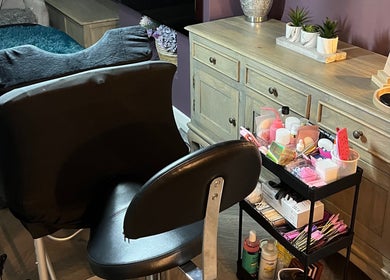A relaxation chair and beauty products at 888 Beauty by Jess, Ellesmere Port, England, GB offering a serene atmosphere.