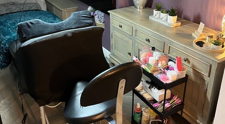 A relaxation chair and beauty products at 888 Beauty by Jess, Ellesmere Port, England, GB offering a serene atmosphere.