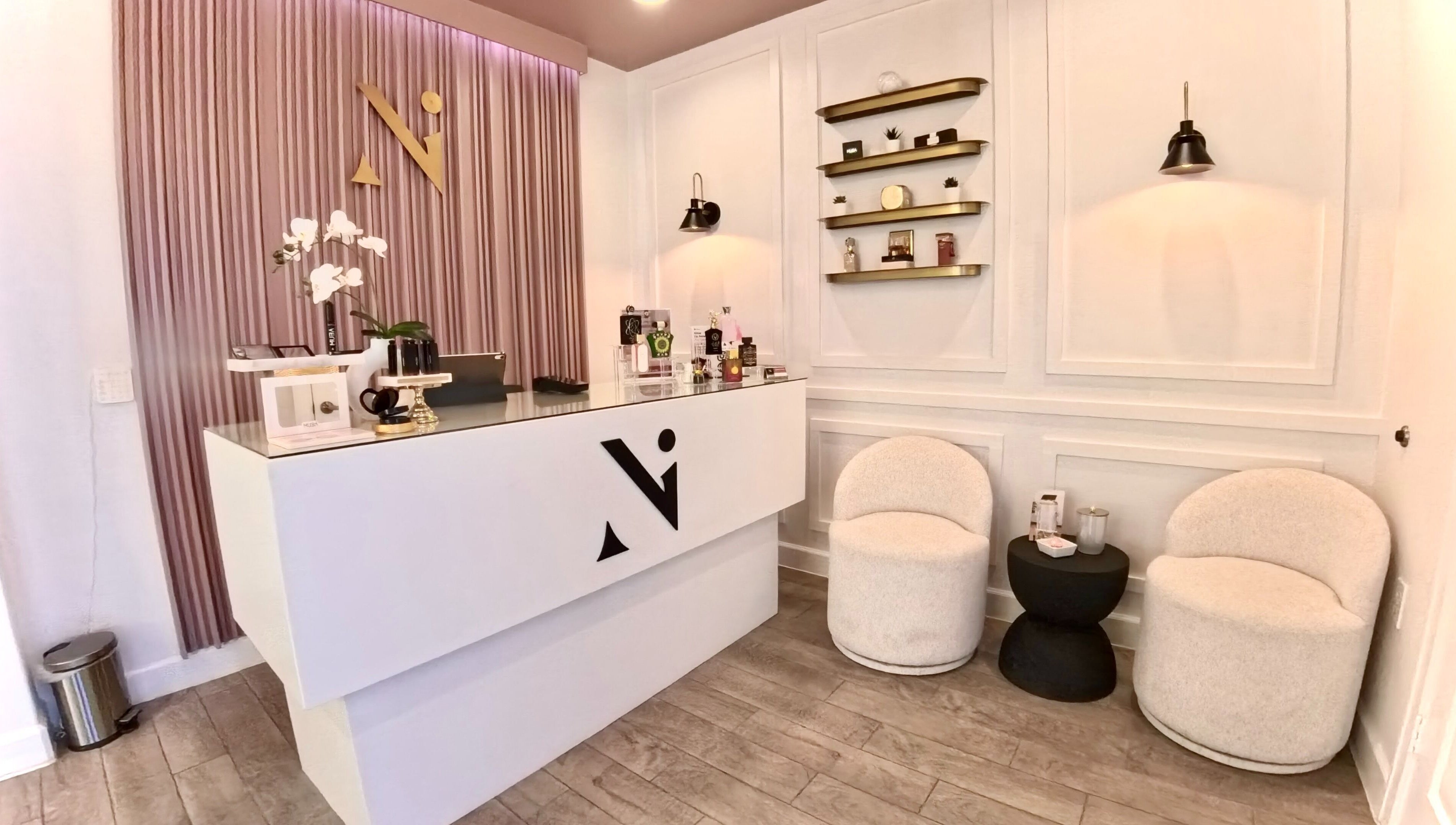 Chic reception area at Nadia Isabel Studio, Katy, Texas, US with stylish decor and seating.