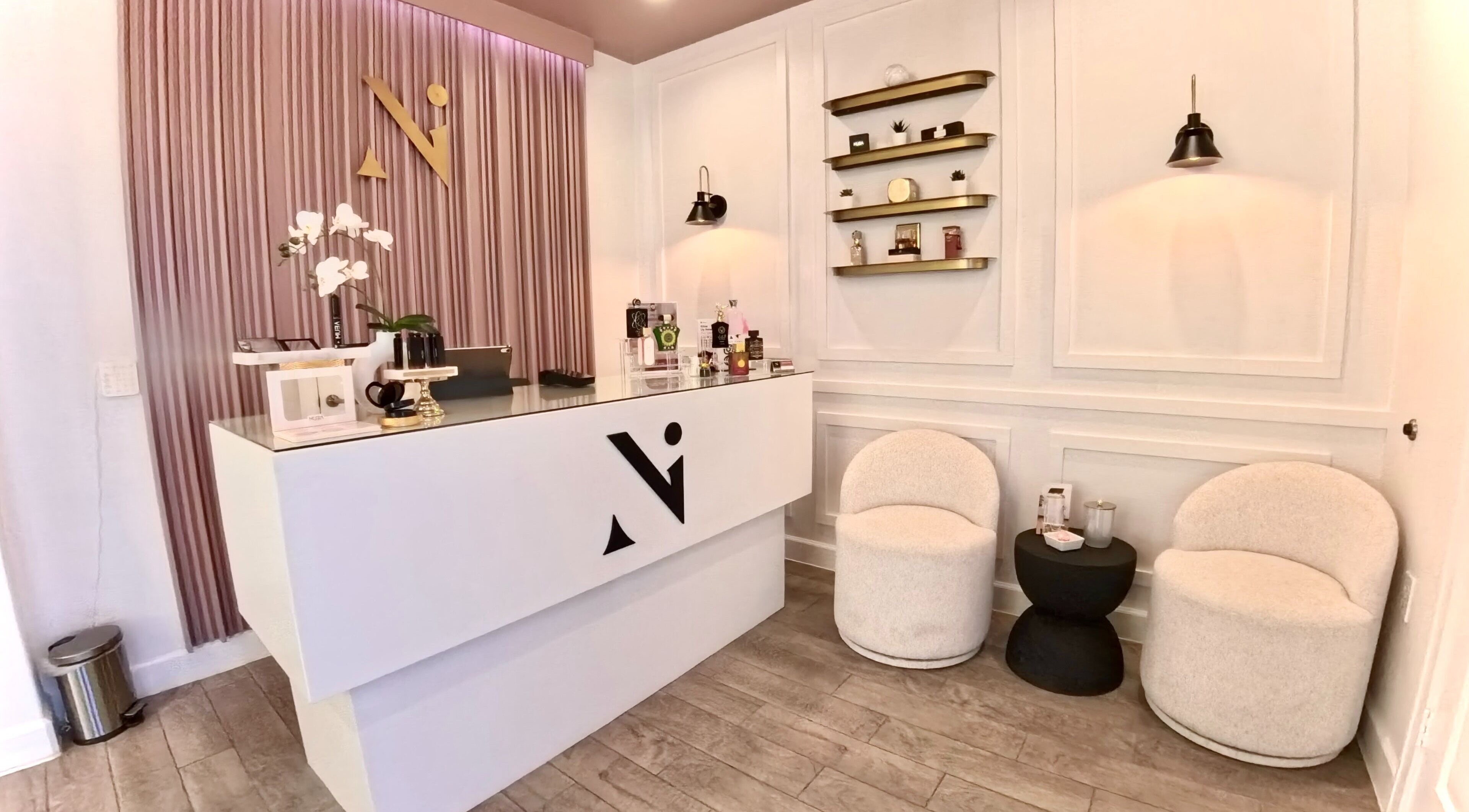 Elegant reception at Nadia Isabel Studio, Katy, Texas, US with modern decor and plush seating.