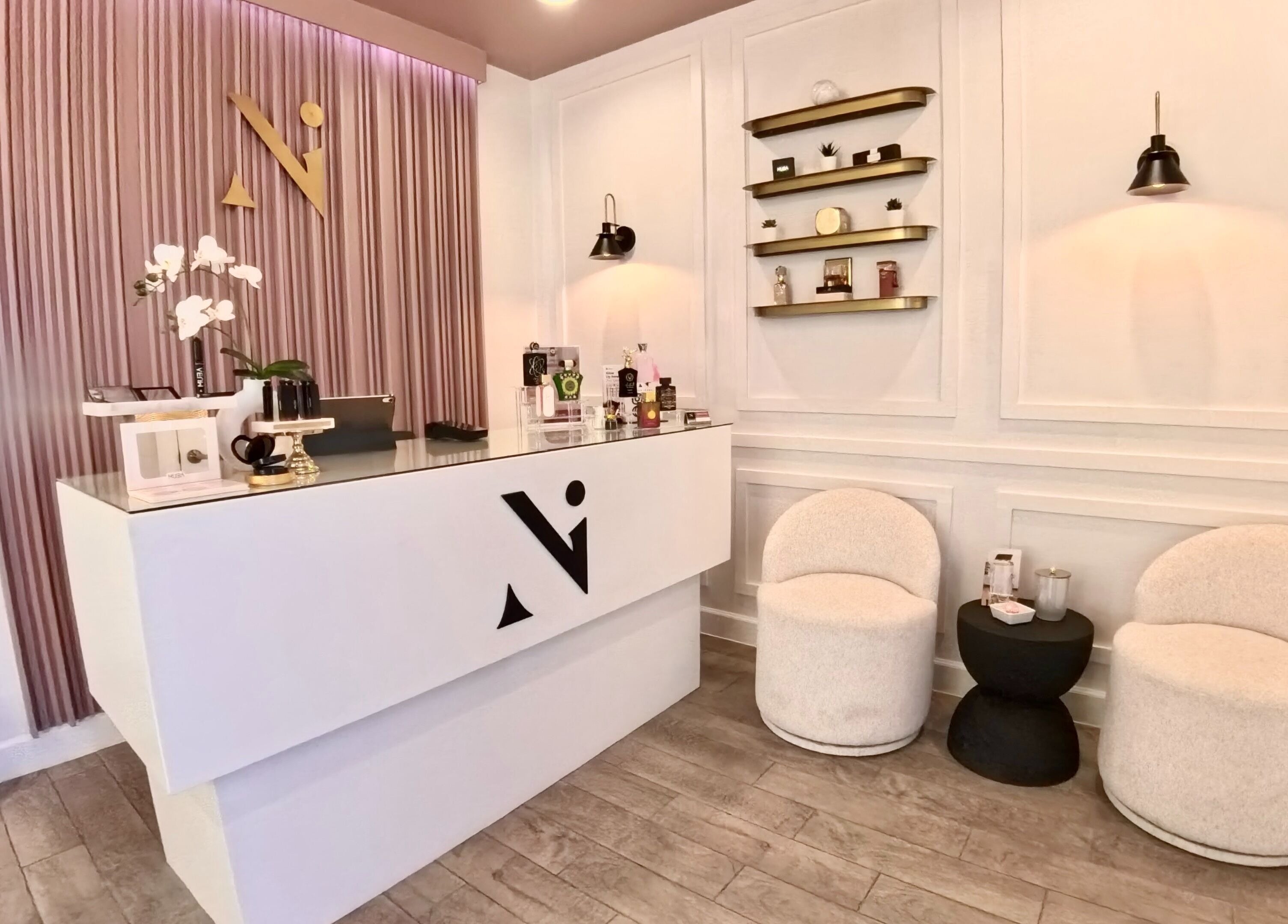 Elegant reception with plush chairs and decor at Nadia Isabel Studio in Katy, Texas, US.