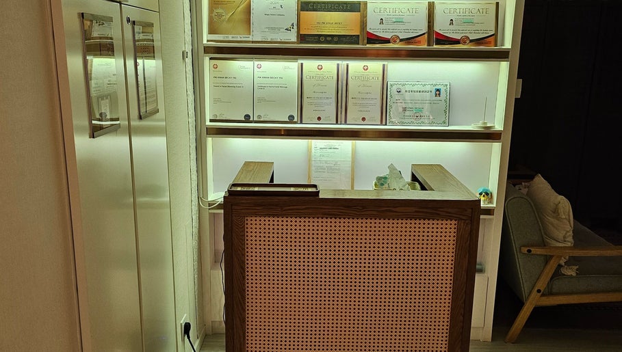 Magic Forest reception in Kowloon, HK, with certificates on display showcasing wellness expertise.
