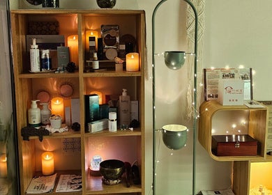 Candles and beauty products creating a calming ambiance at Magic Forest in Kowloon, HK.