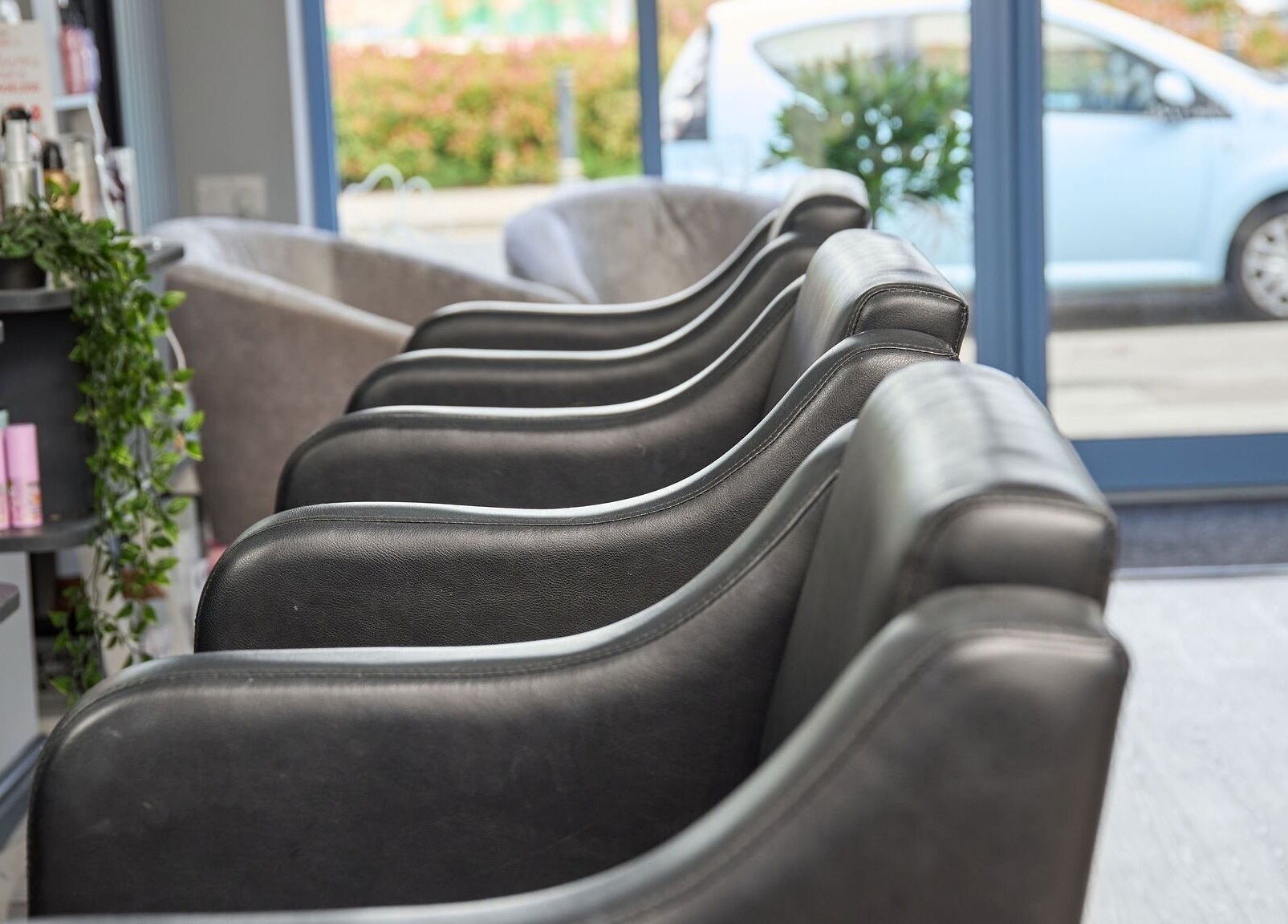 Luxury seating at Liz Lewis Hair Studio in Chorley, England, GB, showcasing elegant interior design.