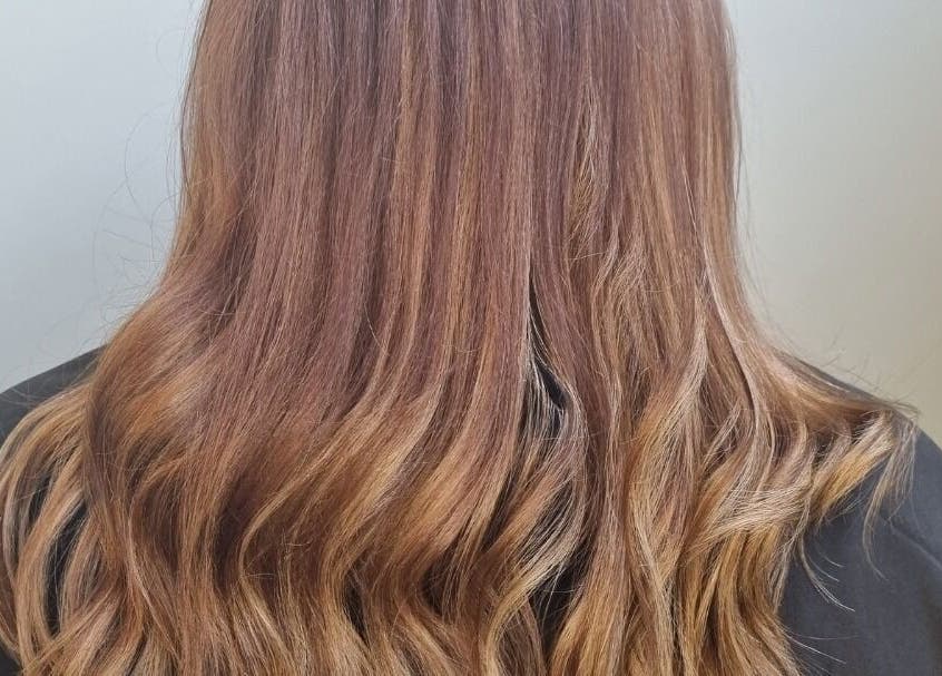 Elegant wavy brown hair styled at Hair By Shell Mobile Based, Stockton on Tees, England, GB.