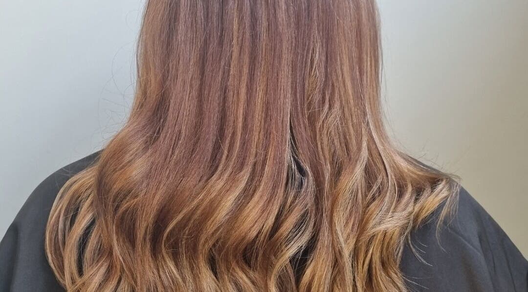 Elegant wavy brown hair styled at Hair By Shell Mobile Based, Stockton on Tees, England, GB.
