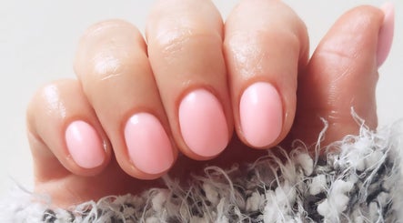Elegant pink manicure at Cody's nail boutique in Portsmouth, England, GB, showcasing quality nail services.