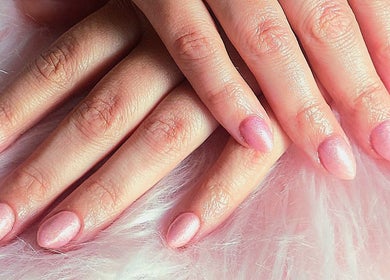 Manicured pink nails at Cody's Nail Boutique, Portsmouth, England, GB. Stylish nail design and care.