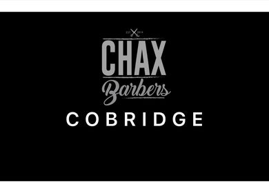 Chax Barbers logo on Cobridge background, Waterloo Rd, Stoke-on-Trent, England, GB.