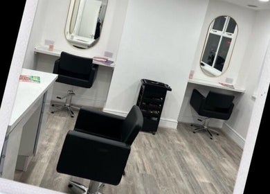 Modern salon chairs at Chax Salon | Waterloo Road, Stoke-on-Trent, England, GB.