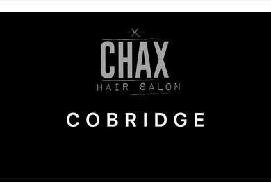 Chax Salon | Waterloo Road, located in Stoke-on-Trent, England, GB. Stylish salon signage on a sleek black background.