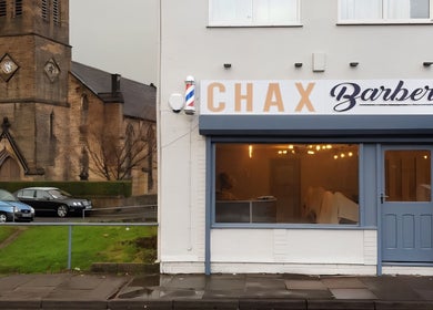 Chax Barbers on Waterloo Rd, Stoke-on-Trent, England, a modern barber shop with welcoming exterior.