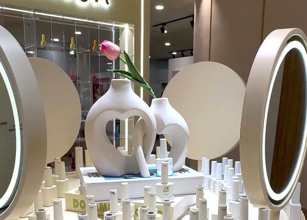 Elegant display at Shyunmija LOT10, Kuala Lumpur, showcasing modern decor and beauty products.