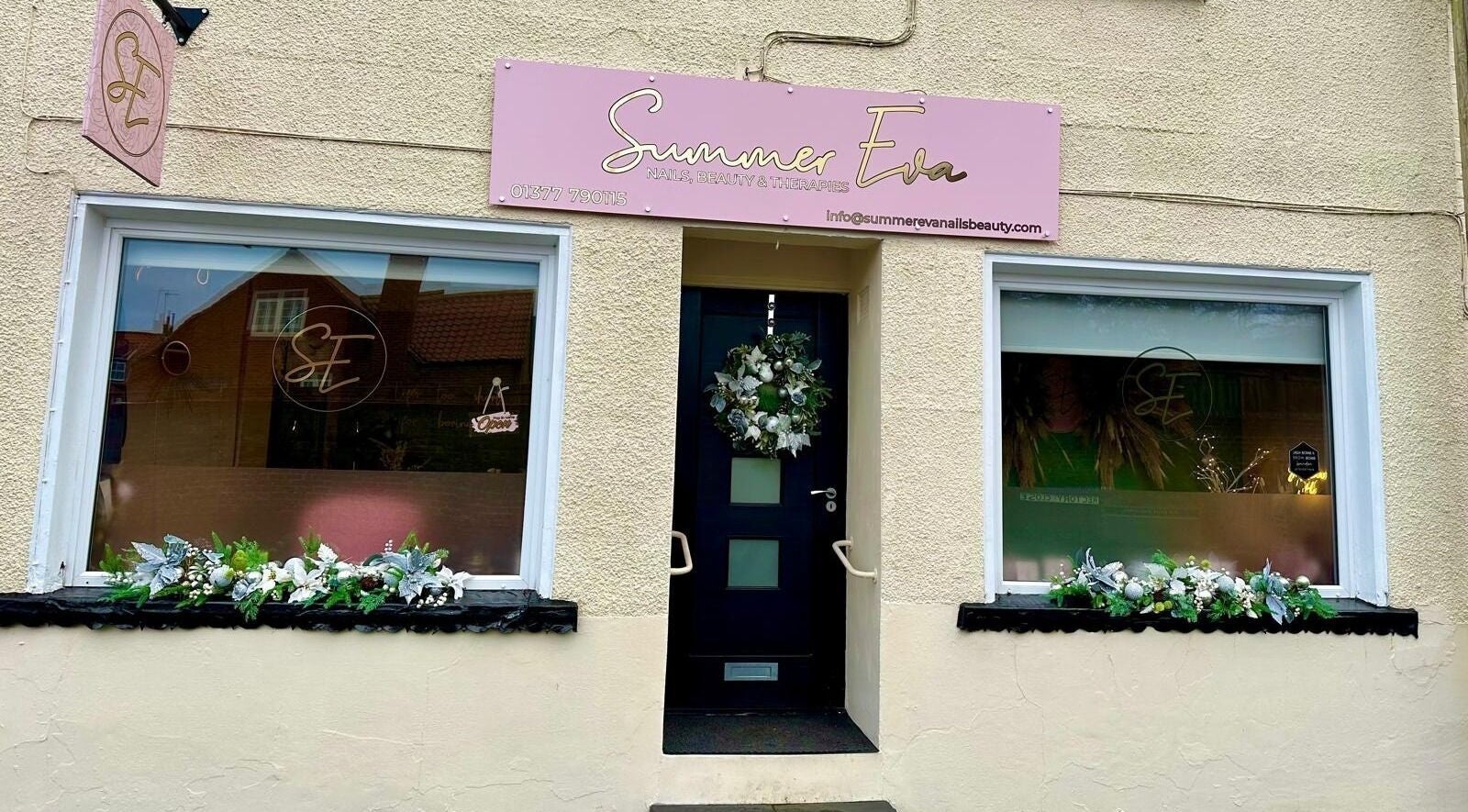 Entrance of Summer Eva Nafferton, a beauty venue in Nafferton, England, GB, decorated with floral arrangements.