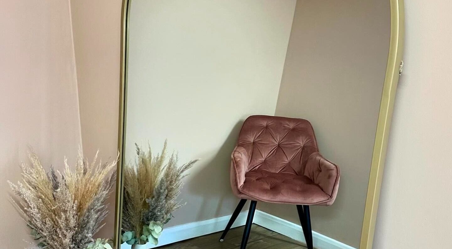 Elegant chair and mirror setup at Summer Eva Cranswick, Hutton Cranswick, England, GB.