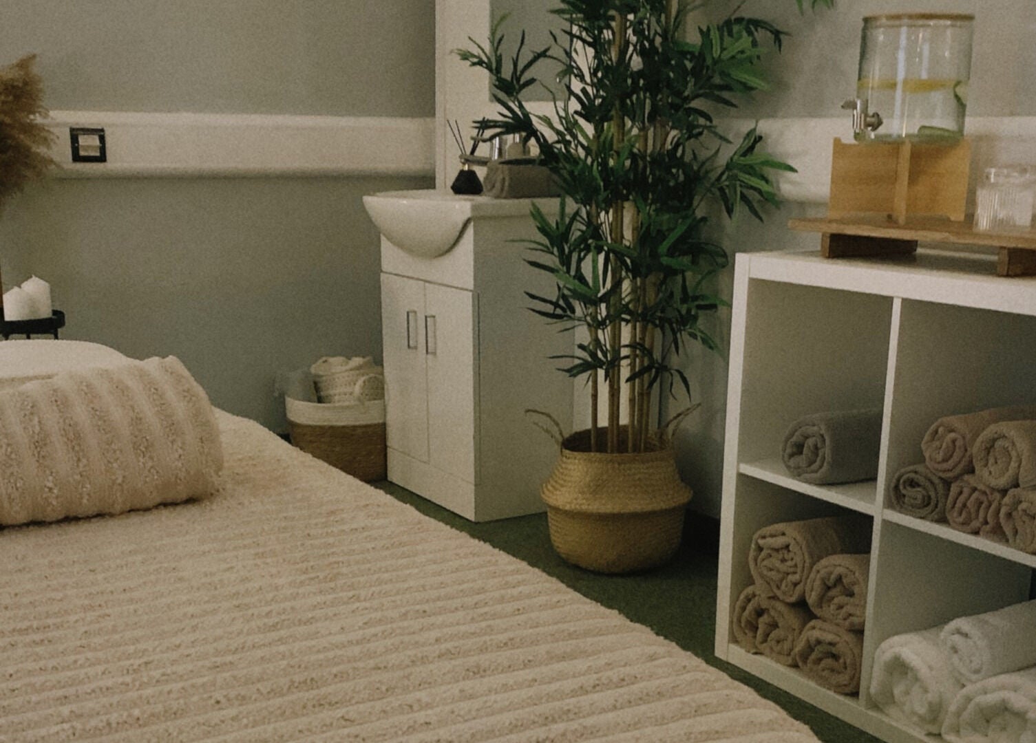 Calm massage room at HB Holistic Massage in Belfast, Northern Ireland, GB with cozy decor and soft lighting.