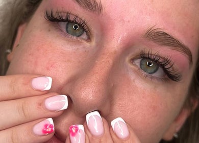 Close-up of manicured nails and lashes at GLOW By Mads, Abbots Langley, England, GB.