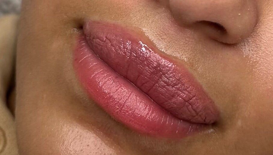 Close-up of glossy lips treated at 𝐆𝐋𝐎𝐖 𝐁𝐲 𝐌𝐚𝐝𝐬, Abbots Langley, England, GB.
