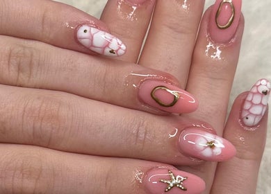 Elegant pink and gold nail art at 𝐆𝐋𝐎𝐖 𝐁𝐲 𝐌𝐚𝐝𝐬 in Abbots Langley, England, GB.