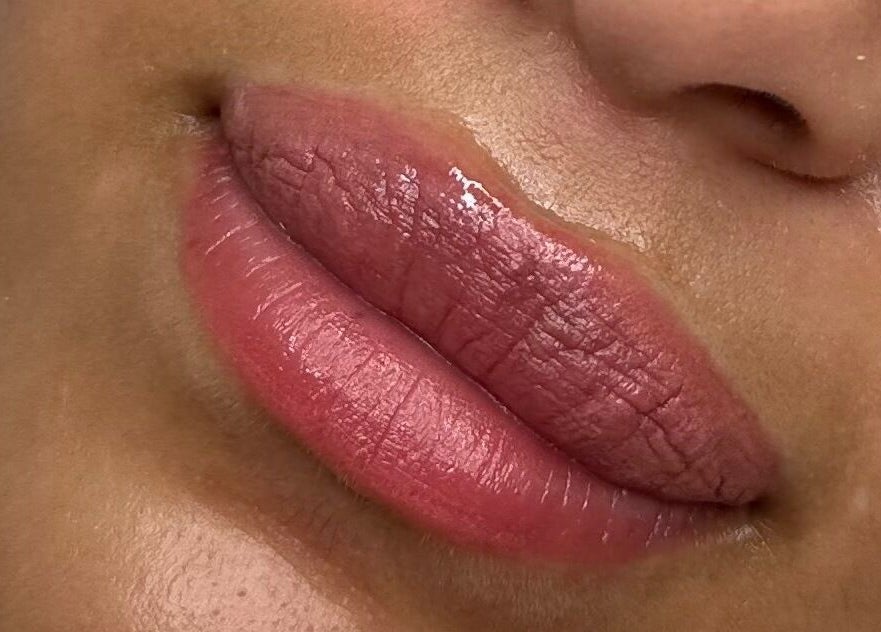 Close-up of lush, glossy lips at Glow by Mads, Abbots Langley, England, GB
