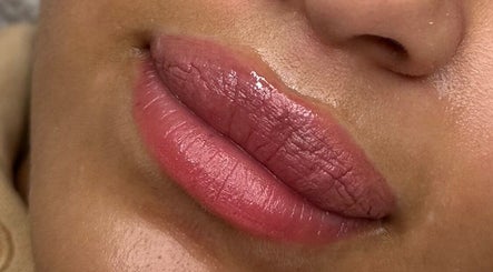 Close-up of lush, glossy lips at Glow by Mads, Abbots Langley, England, GB