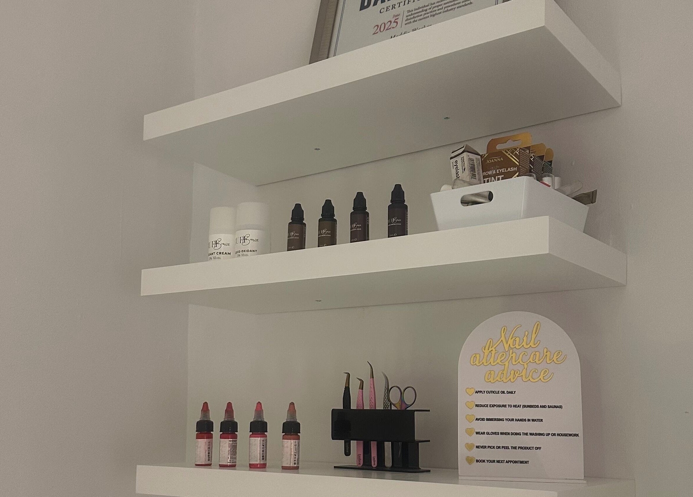 Organized beauty products on shelves at Glow by Mads in Abbots Langley, England, GB.