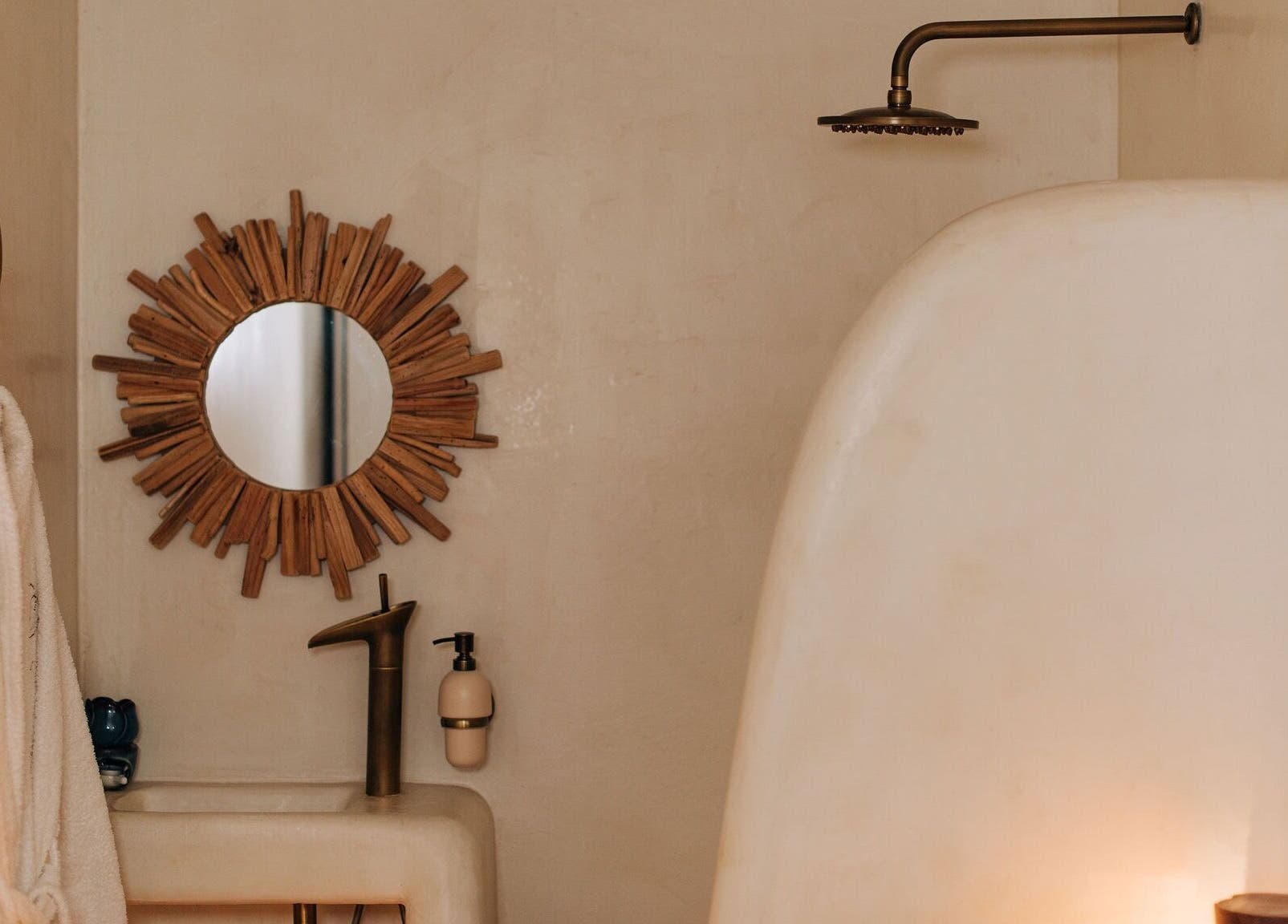 Elegant spa interior with rustic mirror and shower at Bayou Spa, London, England, GB.