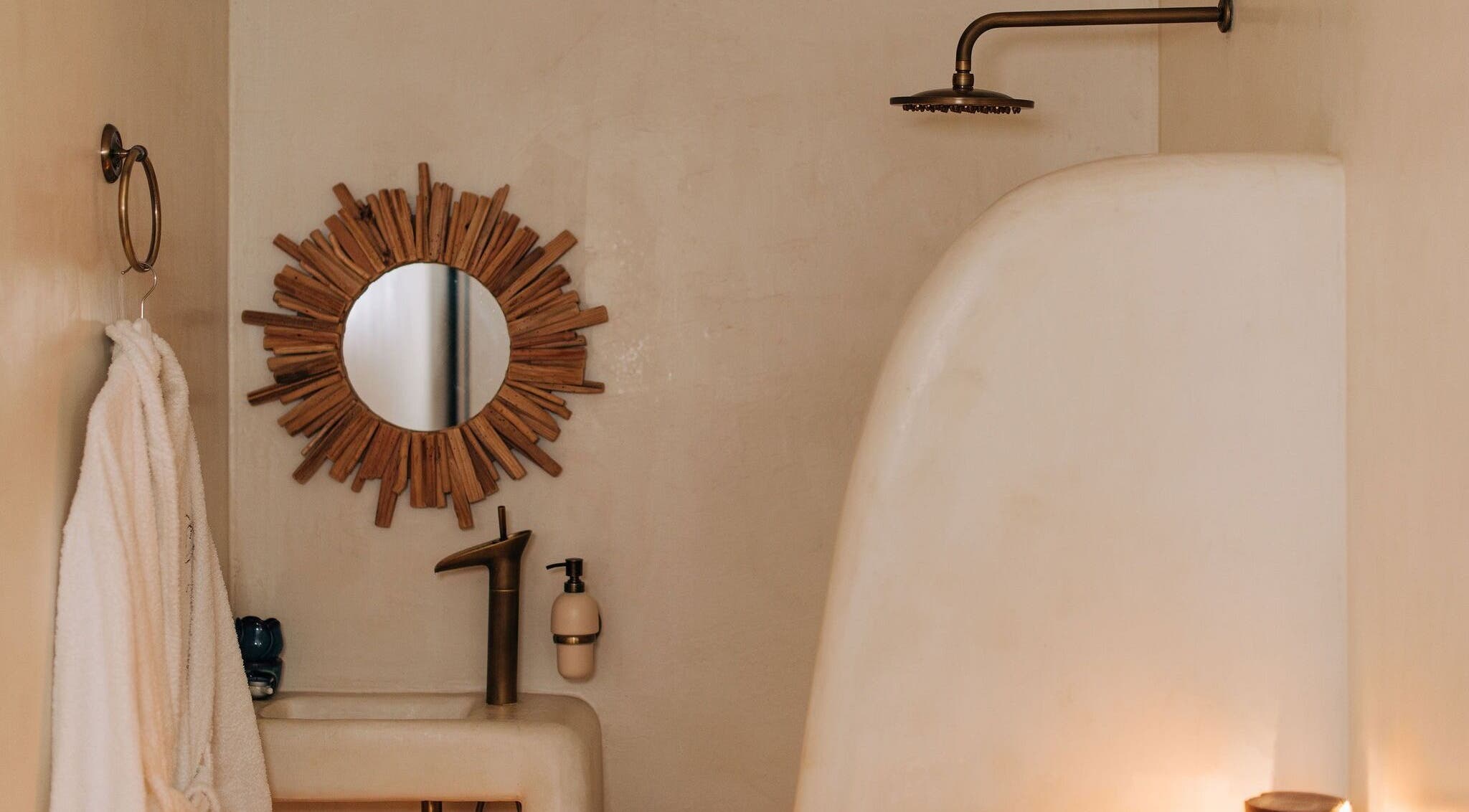 Elegant spa interior with rustic mirror and shower at Bayou Spa, London, England, GB.